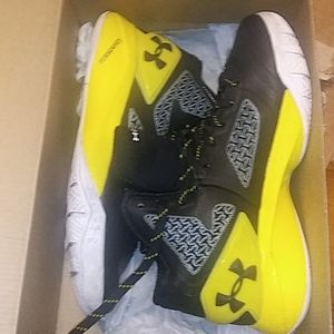 Black and yellow under armour clutchfit drive 2s